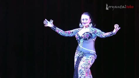 helena vlahos|Mesmerizing Belly Dance: Watch Helena Vlahoss Famous Nine。